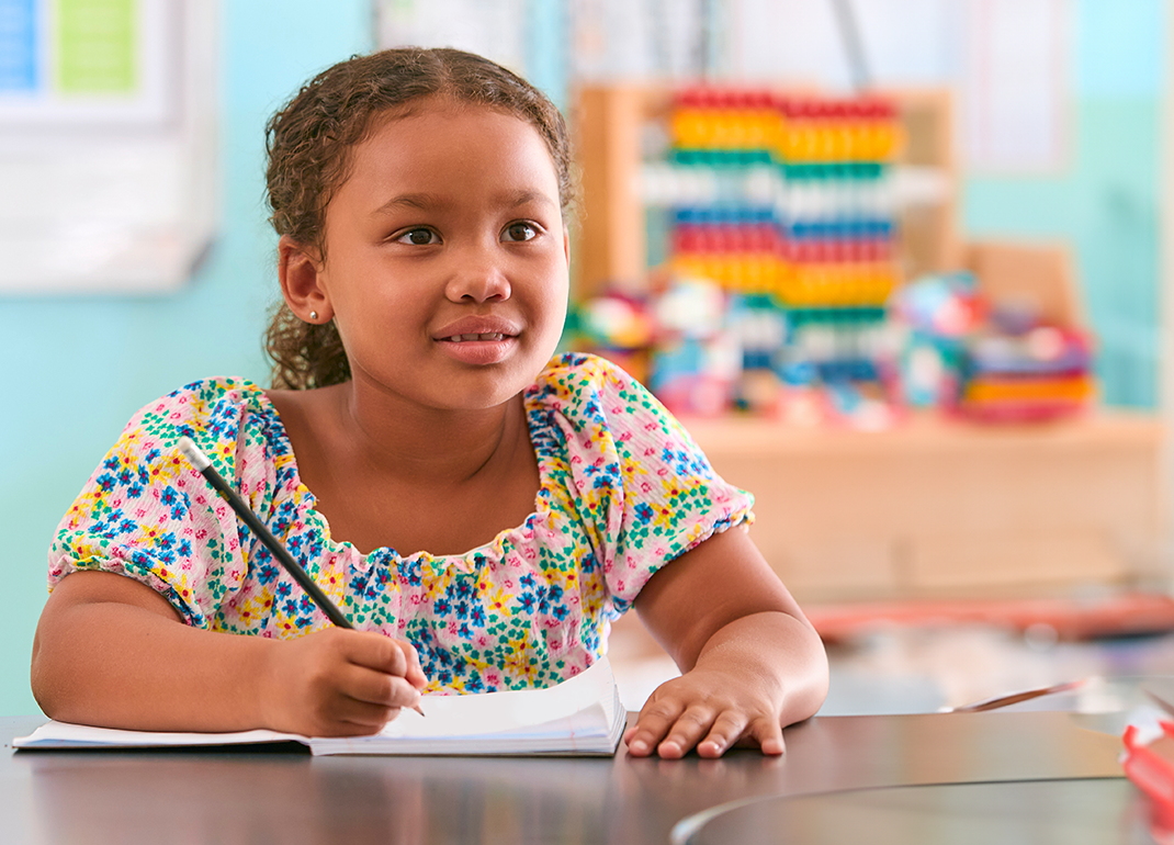 child-looking-at-front-of-class